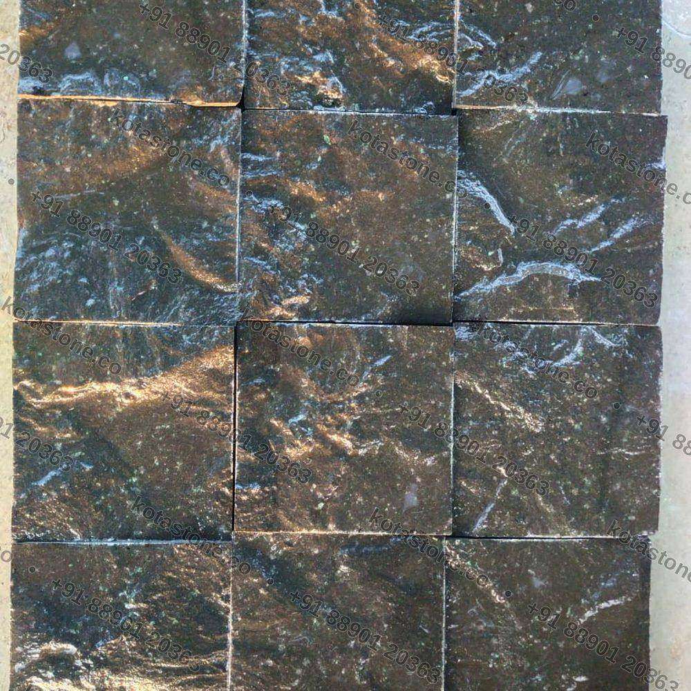 Black basalt cobbles loaded onto a truck for dispatch