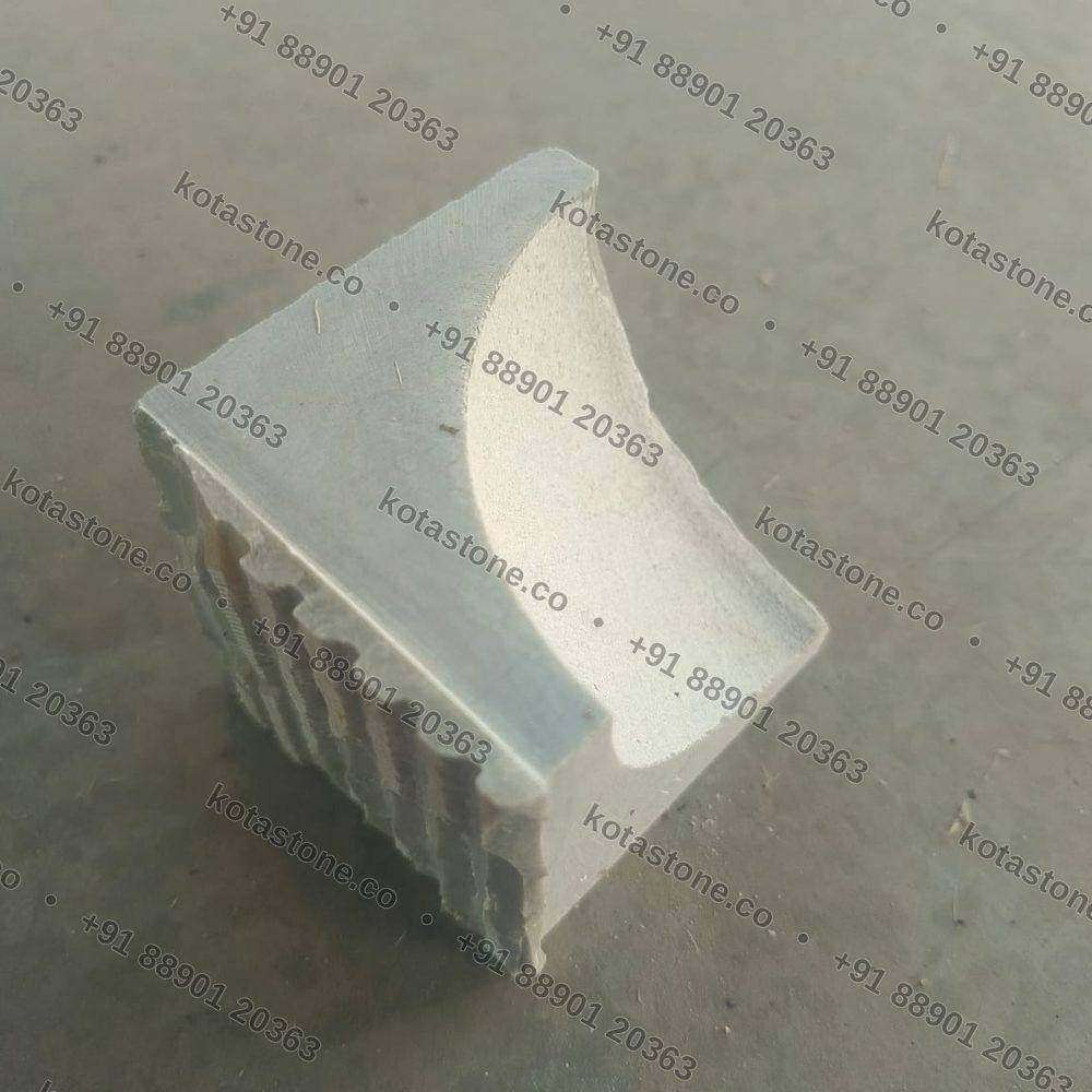 Internal corner piece for Kota stone coving, cut to the cove profile