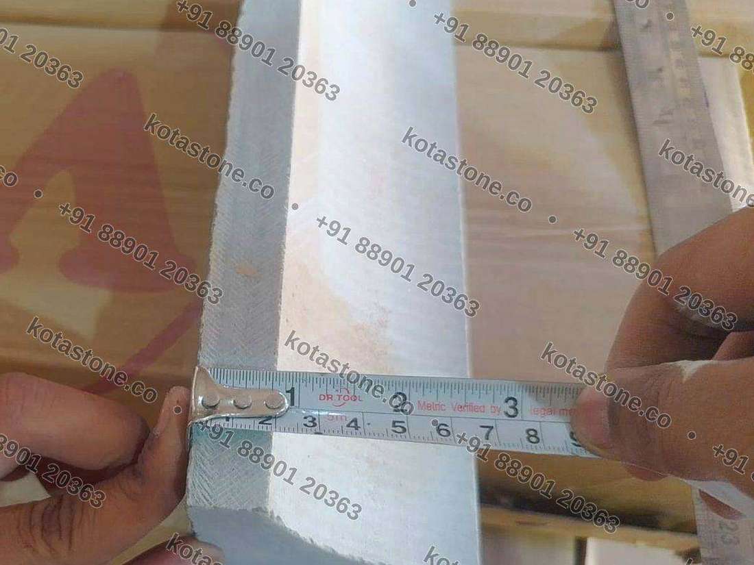 Tape measure across the face of a Kota coving section
