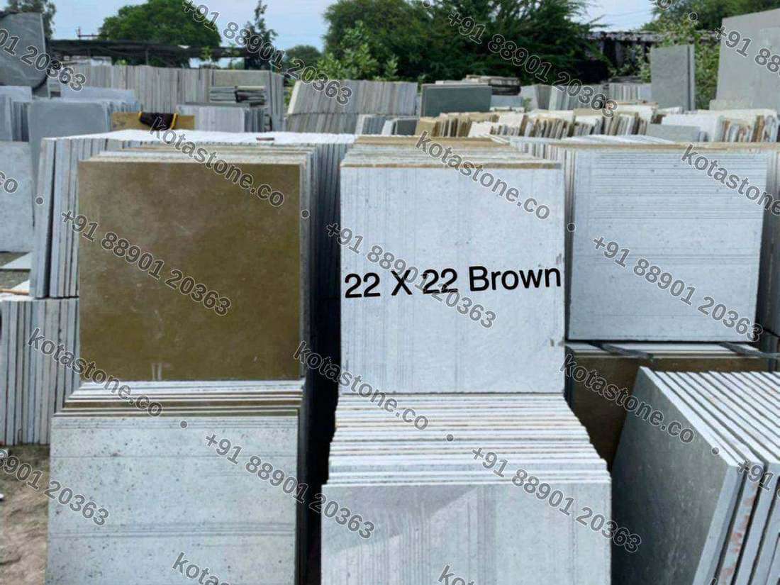 Honed brown Kota 22 by 22 inch slabs marked in the yard