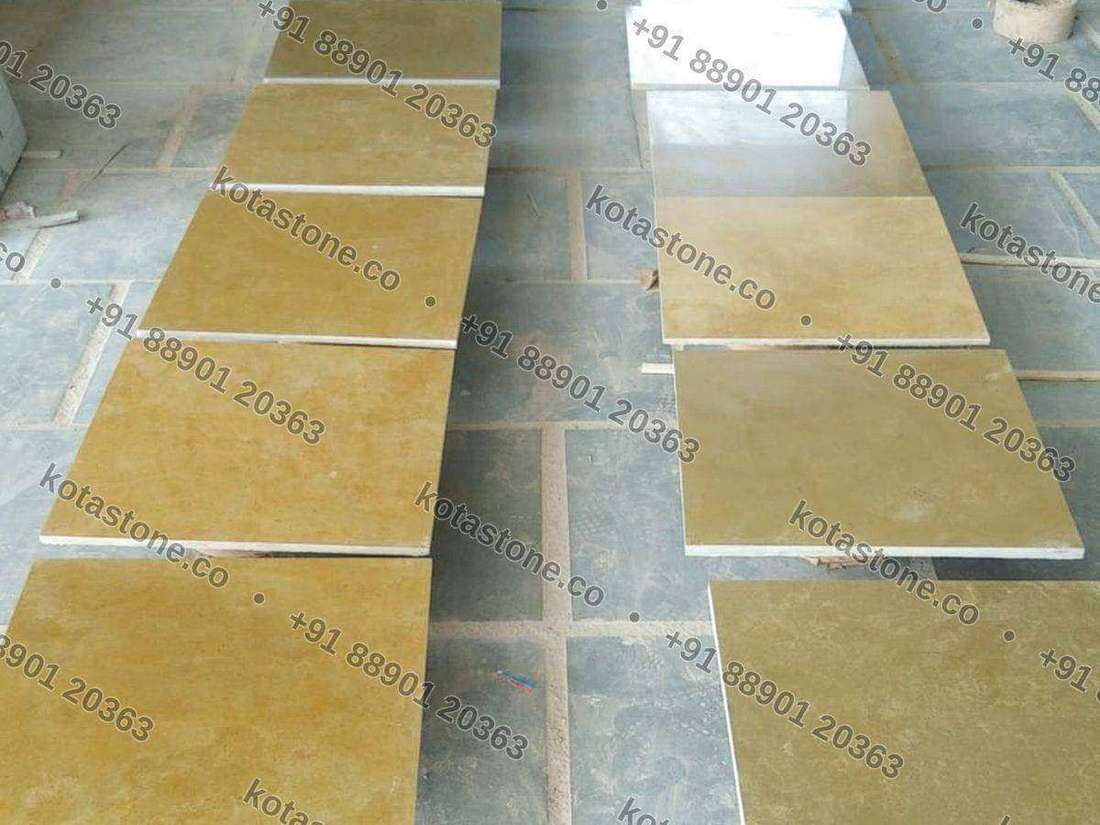 Brown polished Kota tiles laid out on the yard floor