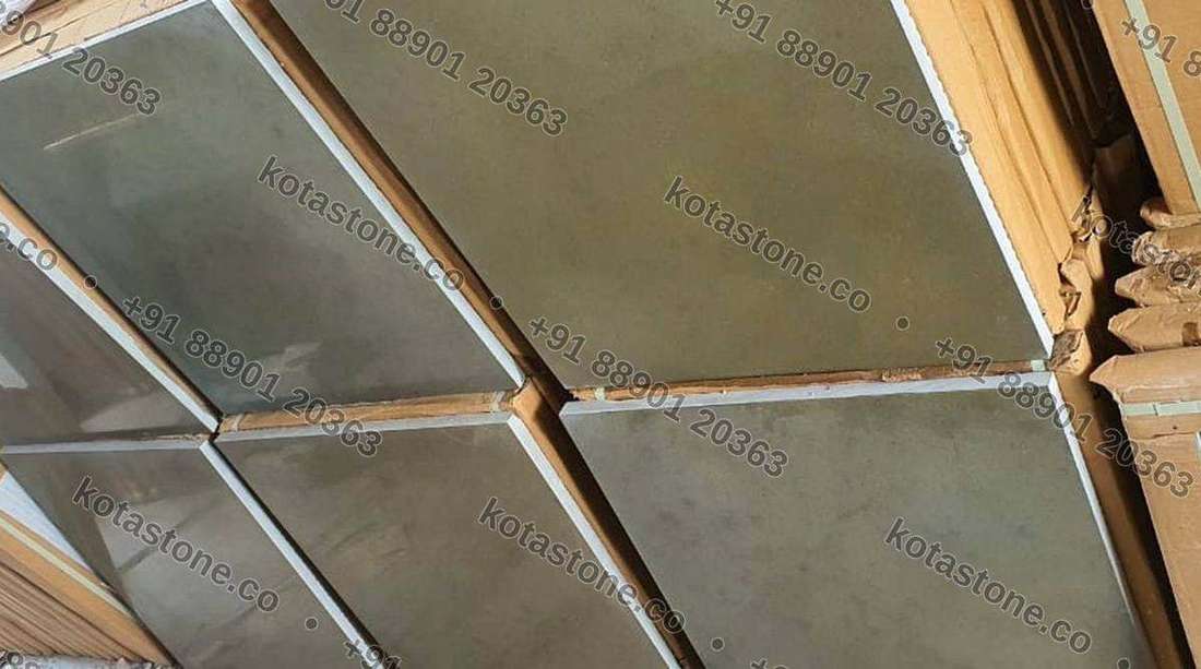 Brown polished Kota packed and edge-protected for dispatch