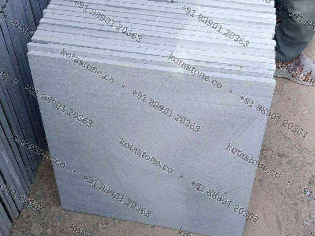 Diamond-cut Kota stacked at the yard