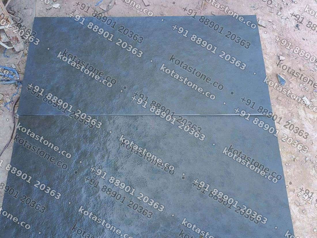 Two calibrated green Kota slabs, 46 by 22 inches, laid out at the yard