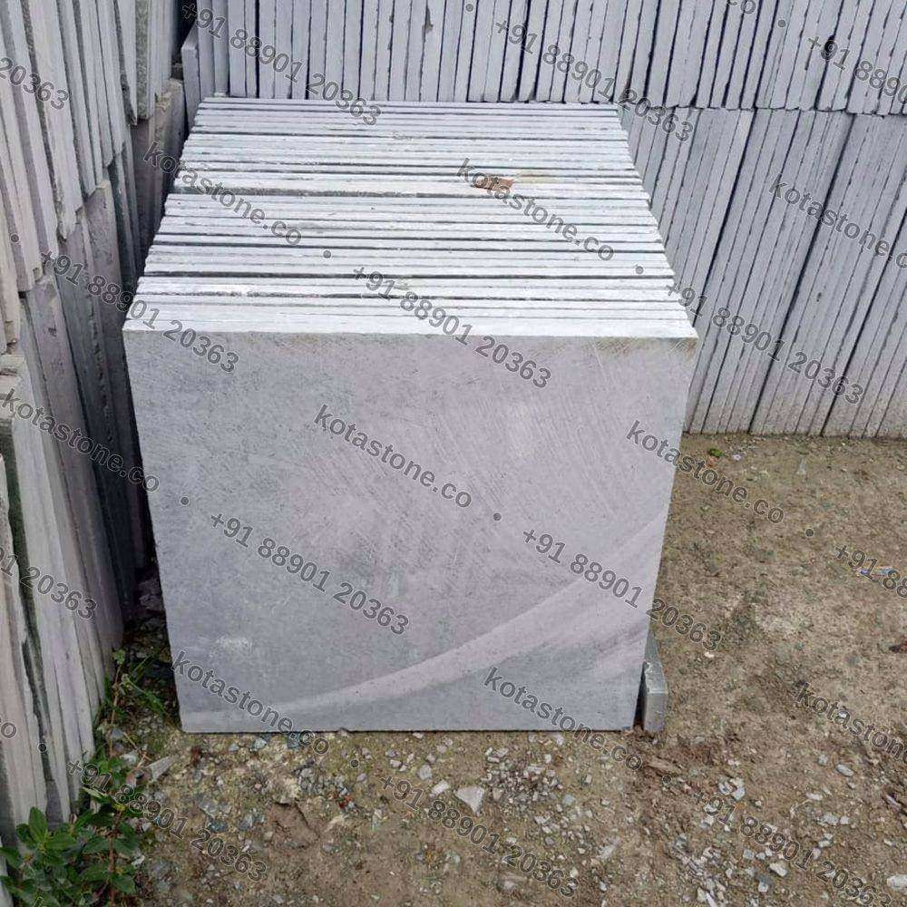 Kota stone being loaded by hand for a wholesale dispatch
