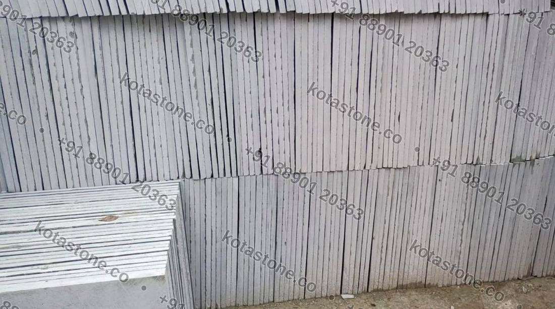 Blue-grey Kota stacked on edge, natural finish