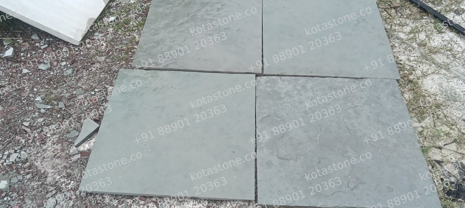 Waterproof grade Kota stone laid outdoors, four natural-face tiles with mortar joints