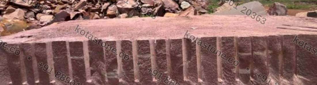 Sandstone block channelled for splitting